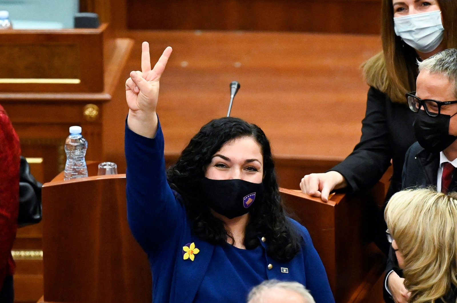 Newly elected President of Kosovo Vjosa Osmani reacts after being sworn in during a parliament session in Pristina, Kosovo, April 4, 2021. (Photo by Armend NIMANI / AFP)