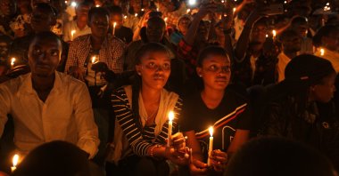People attend a candlelight vigil during a memorial service marking 25 years since the 1994 Rwanda genocide, at Amahoro stadium in the capital Kigali, Rwanda, April 7, 2019. (AP Photo)