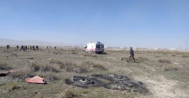 A view of the crash site where parts of the plane are scattered around, in Konya, central Turkey, Apr. 7, 2021. (AA PHOTO) 