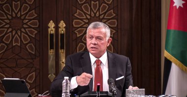 Jordanian King Abdullah II speaks during a meeting at the House of Representatives in the capital Amman, Jordan, March 23, 2021. (Jordanian Royal Palace via AFP)