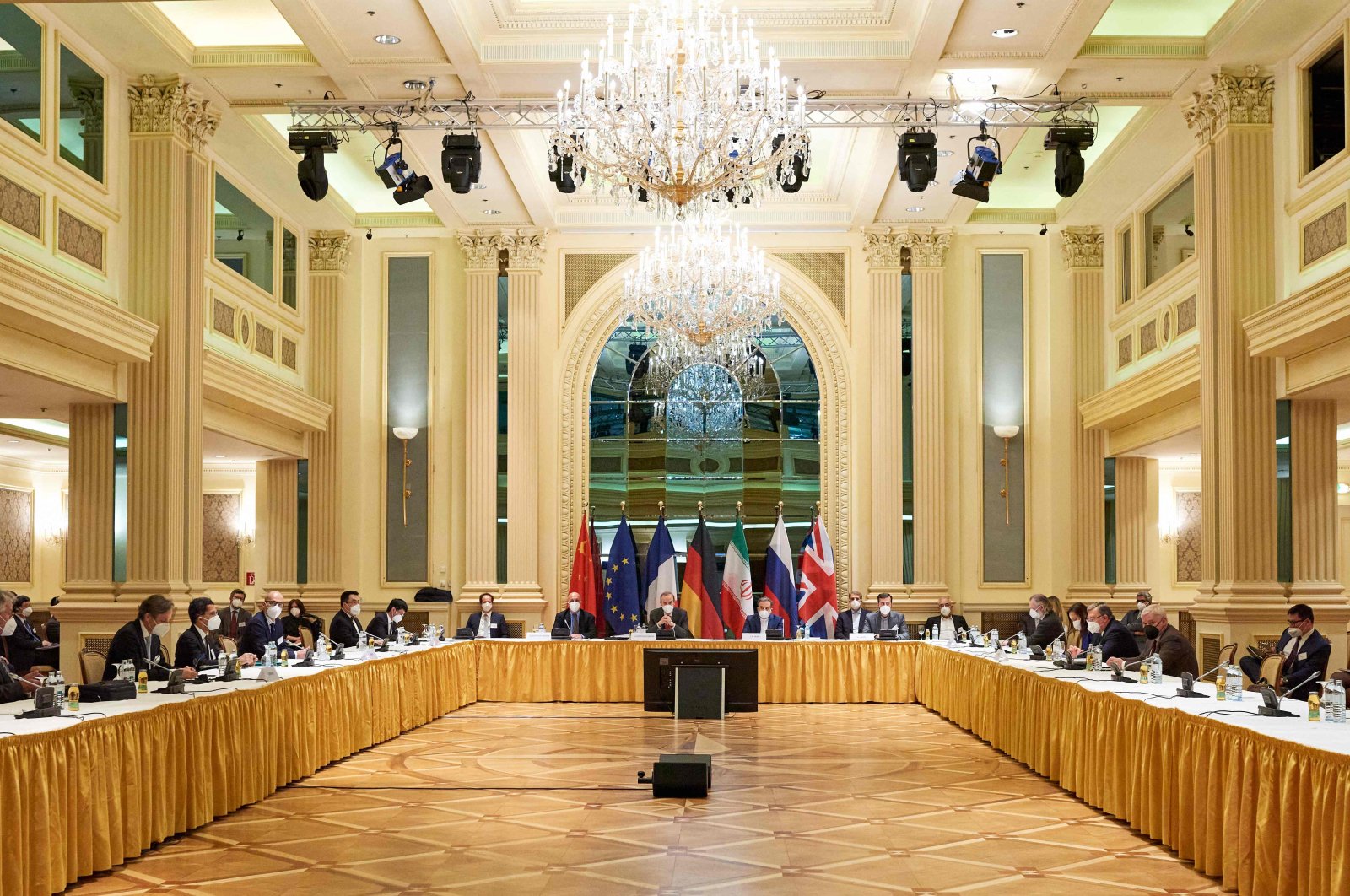 Diplomats from the EU, China, Russia and Iran at the start of talks at the Grand Hotel in Vienna, Austria, April 6, 2021. (Vienna EU Delegation Photo via AFP)