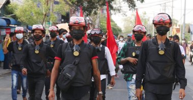 Demonstrators march during an anti-military coup protest in Mandalay, Myanmar, April 8, 2021. (EPA Photo)