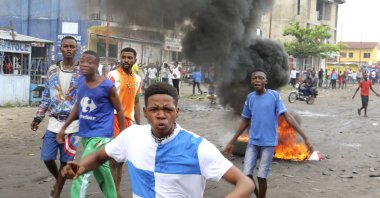 Congolese boys take part in a protest against President Joseph Kabila's refusal to step down from power in Kinshasa, Democratic Republic of Congo, Dec. 31, 2017. (AP Photo)