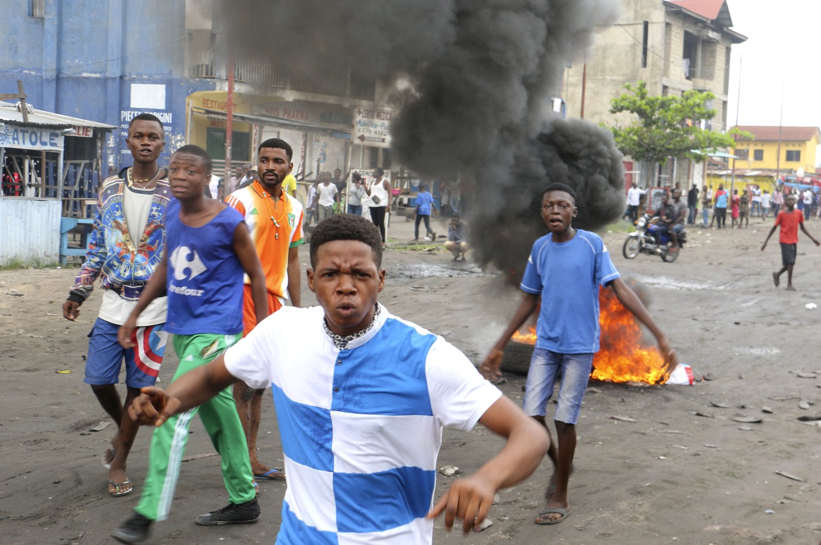 Congolese boys take part in a protest against President Joseph Kabila's refusal to step down from power in Kinshasa, Democratic Republic of Congo, Dec. 31, 2017. (AP Photo)