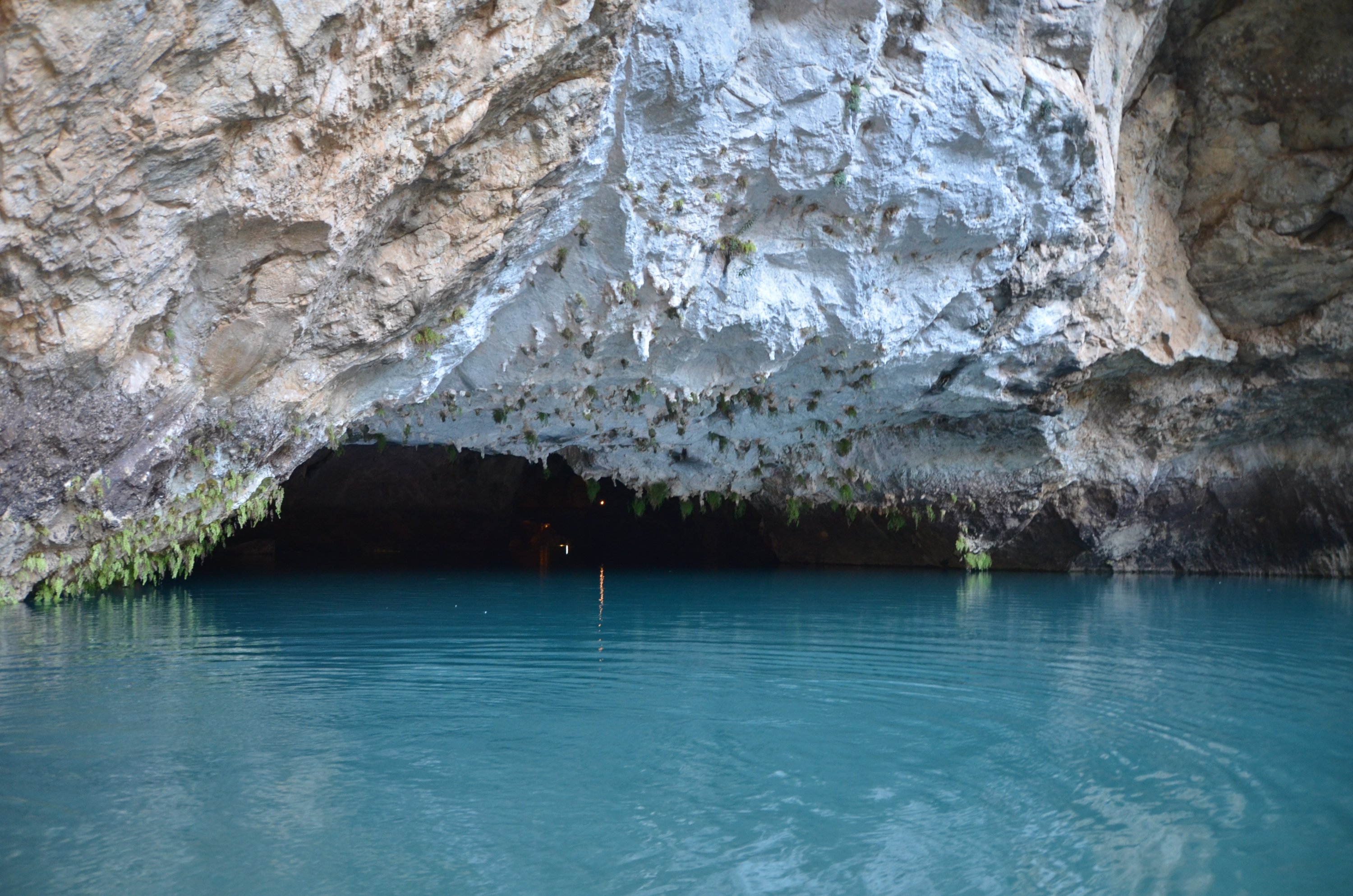 The entrance of Altınbeşik Cave and its underground lake with its clear, pristine blue waters, Antalya, southern Turkey, March 5, 2021. (IHA Photo)