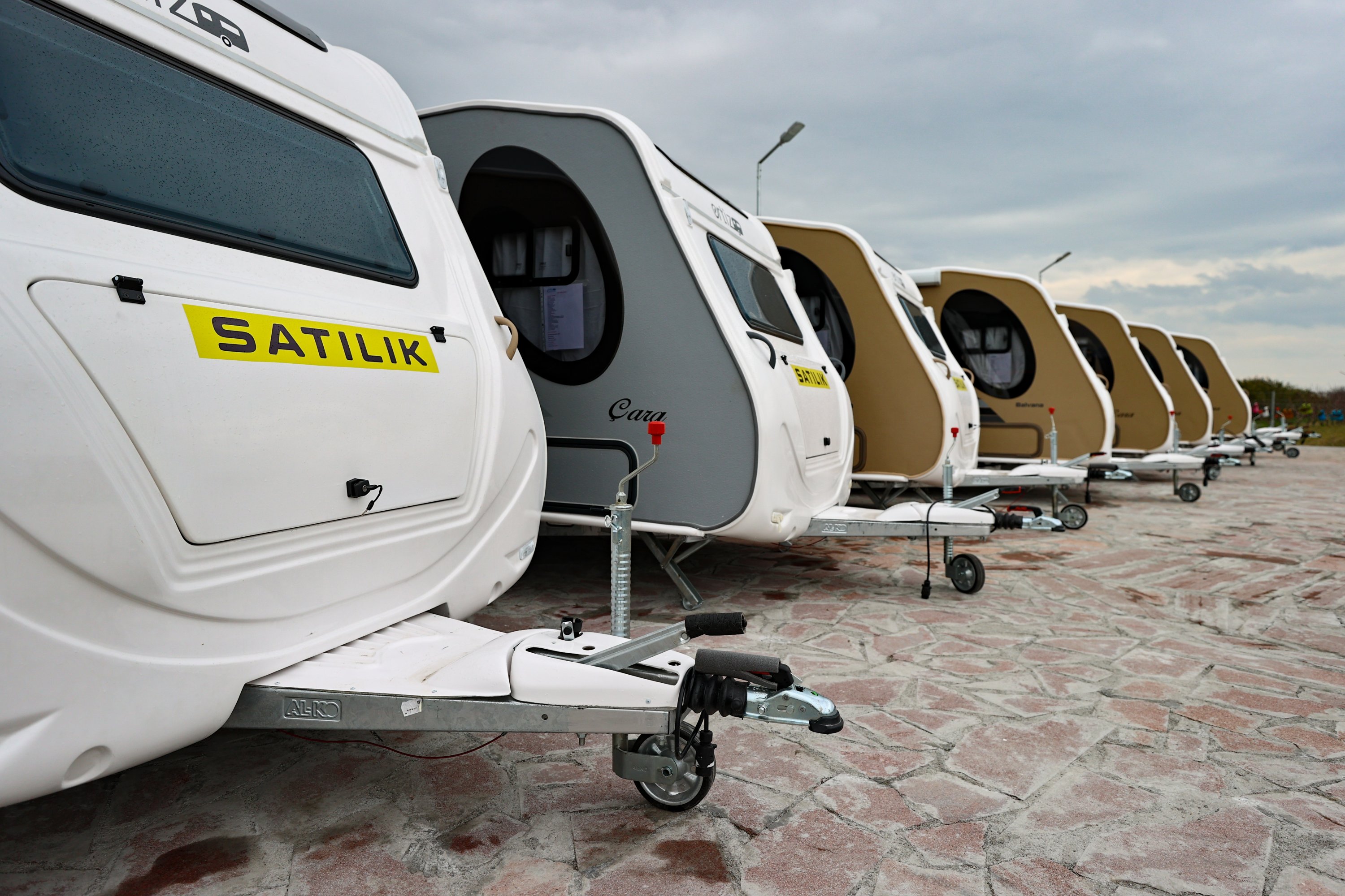 Caravans produced by Izmir-based manufacturer Ortiz Karavan are seen lined in a parking lot, Izmir, western Turkey, April 9, 2021. (AA Photo)