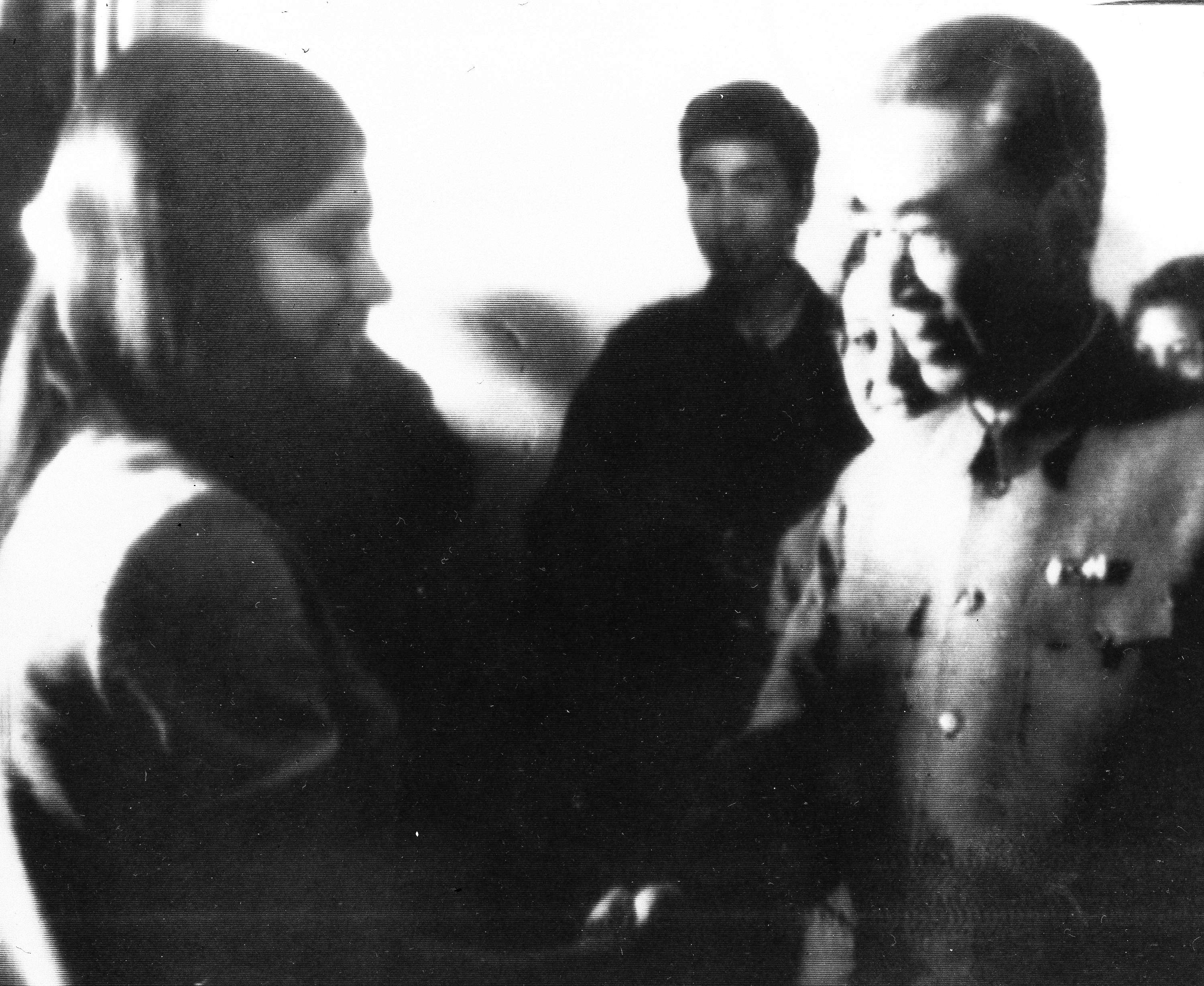 U.S. table tennis team member Judy Bochenski, 15, (L) then-known as Judy Hoarfrost, shakes hands with former China Premier Chow En-Lai in Peking, Communist China, April 14, 1971. (AP Photo)