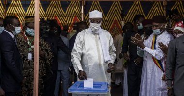 Chadian President Idriss Deby Itno (C) casts his ballot at a polling station in N'djamena, on April 11, 2021. (AFP Photo)