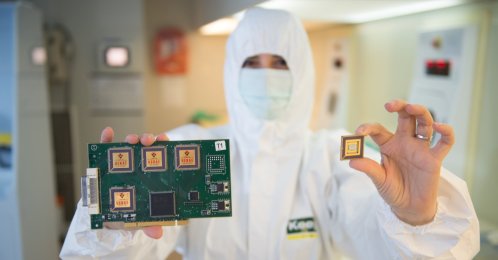 An engineer holds chips produced at a laboratory in the Gebze district of the northwestern province of Kocaeli, Turkey, April 9, 2021. (Photo by Ilhami Yıldırım)