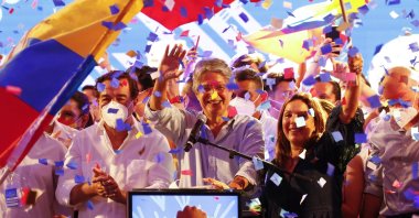 Guillermo Lasso (C), presidential candidate of Creating Opportunities party, (CREO) celebrates after a presidential runoff election at his campaign headquarters in Guayaquil, Ecuador, April 11, 2021. (AP Photo)