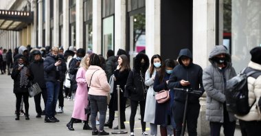 People queue outside a shop on Oxford street, as COVID-19 restrictions ease, in London, Britain, April 12, 2021. (Reuters Photo)