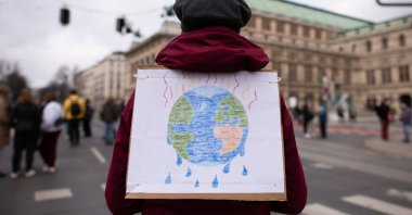Supporters of the Fridays for Future movement protest to demand effective measures against global warming and climate change in Vienna, Austria, March 19, 2021. (Getty Images)
