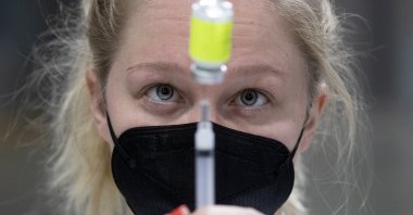 A medical professional prepares a syringe with a dose of the Moderna COVID-19 vaccine at a mass vaccination event hosted by Unity Health Care, at the Walter E. Washington Convention Center in Washington, D.C., the U.S., April 3, 2021. (EPA Photo)