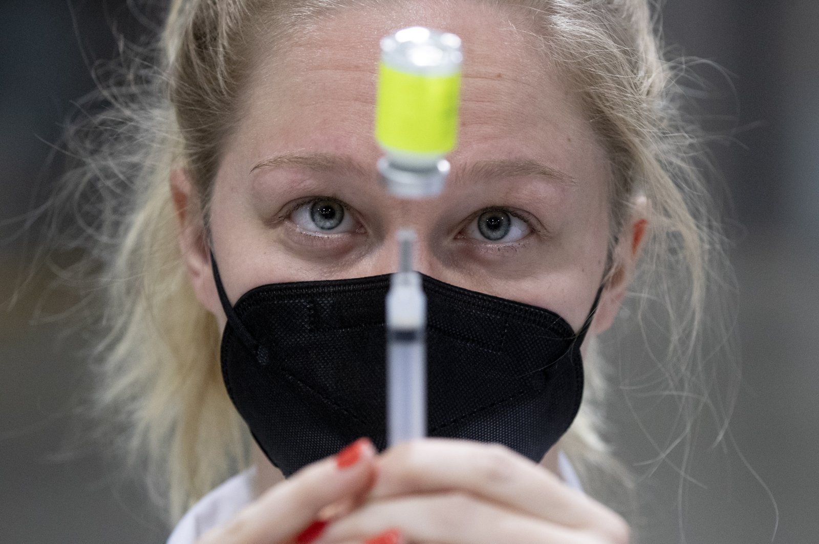 A medical professional prepares a syringe with a dose of the Moderna COVID-19 vaccine at a mass vaccination event hosted by Unity Health Care, at the Walter E. Washington Convention Center in Washington, D.C., the U.S., April 3, 2021. (EPA Photo)