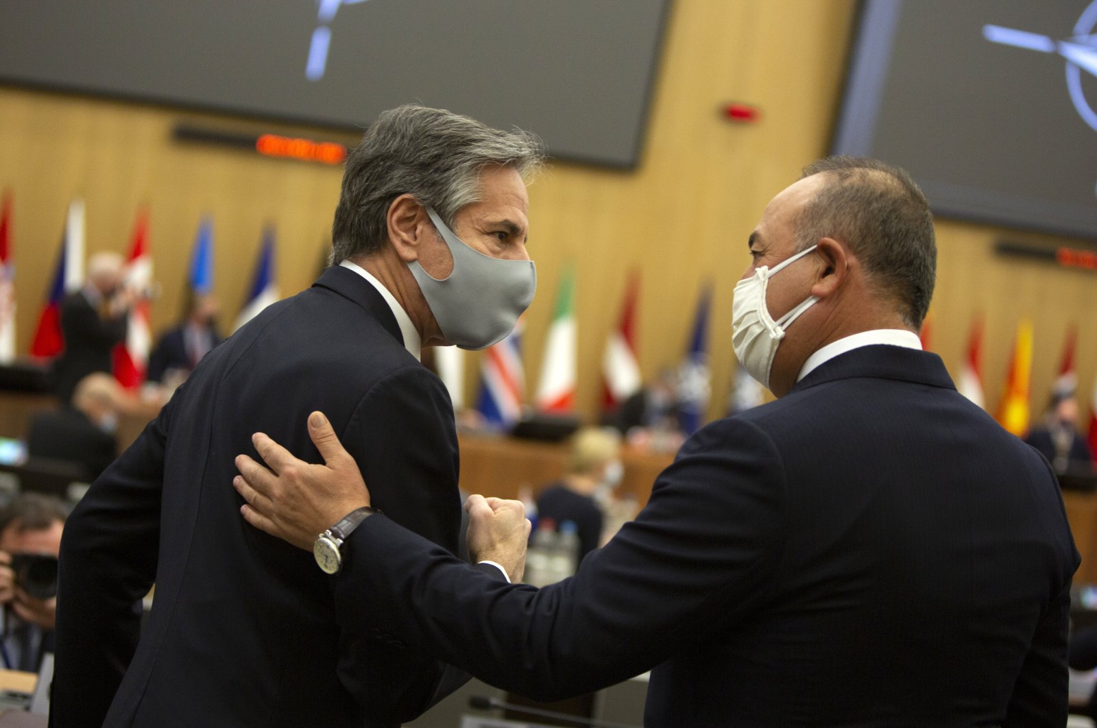 U.S. Secretary of State Antony Blinken (L) speaks with Turkey's Foreign Minister Mevlüt Çavuşoğlu during a meeting of NATO foreign ministers at NATO headquarters in Brussels, Belgium, March 23, 2021. (AP Photo)