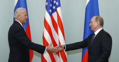 Vice President of the United States Joe Biden (L) shakes hands with Russian Prime Minister Vladimir Putin in Moscow, Russia, March 10, 2011. (AP Photo)