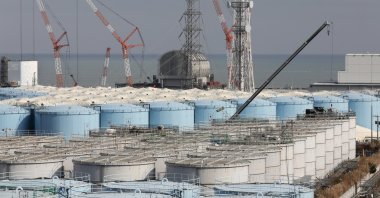 Workers demolish old storage tanks including water processed in ALPS (Multi-nuclide retrieval equipment) at the tsunami-devastated Tokyo Electric Power Company (TEPCO) Fukushima Daiichi Nuclear Power Plant in Okuma town, Fukushima Prefecture, Japan, Jan. 22, 2020. (EPA Photo)