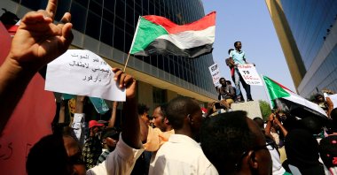 Protesters attend a rally calling for a stop to killing in Darfur and stability for peace, next to a building in front of the Ministry of Justice in Khartoum, Sudan, Sept. 23, 2019. (Reuters Photo)