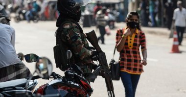 An army personnel stands guard outside the Saint Anthony's Church ahead of a Easter mass on the second anniversary of the Easter Sunday attacks, in Colombo, Sri Lanka, April 4, 2021. (AFP Photo)