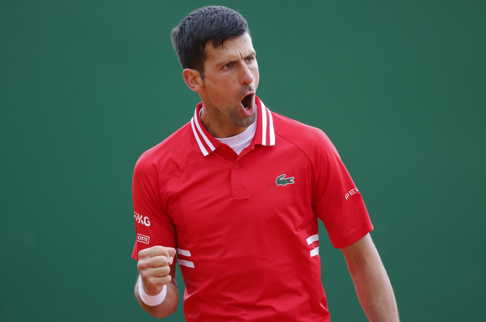 Serbia's Novak Djokovic reacts during his second-round match against Italy's Jannik Sinner at the Monte Carlo Masters, Roquebrune Cap Martin, France, April 14, 2021. (Reuters Photo)