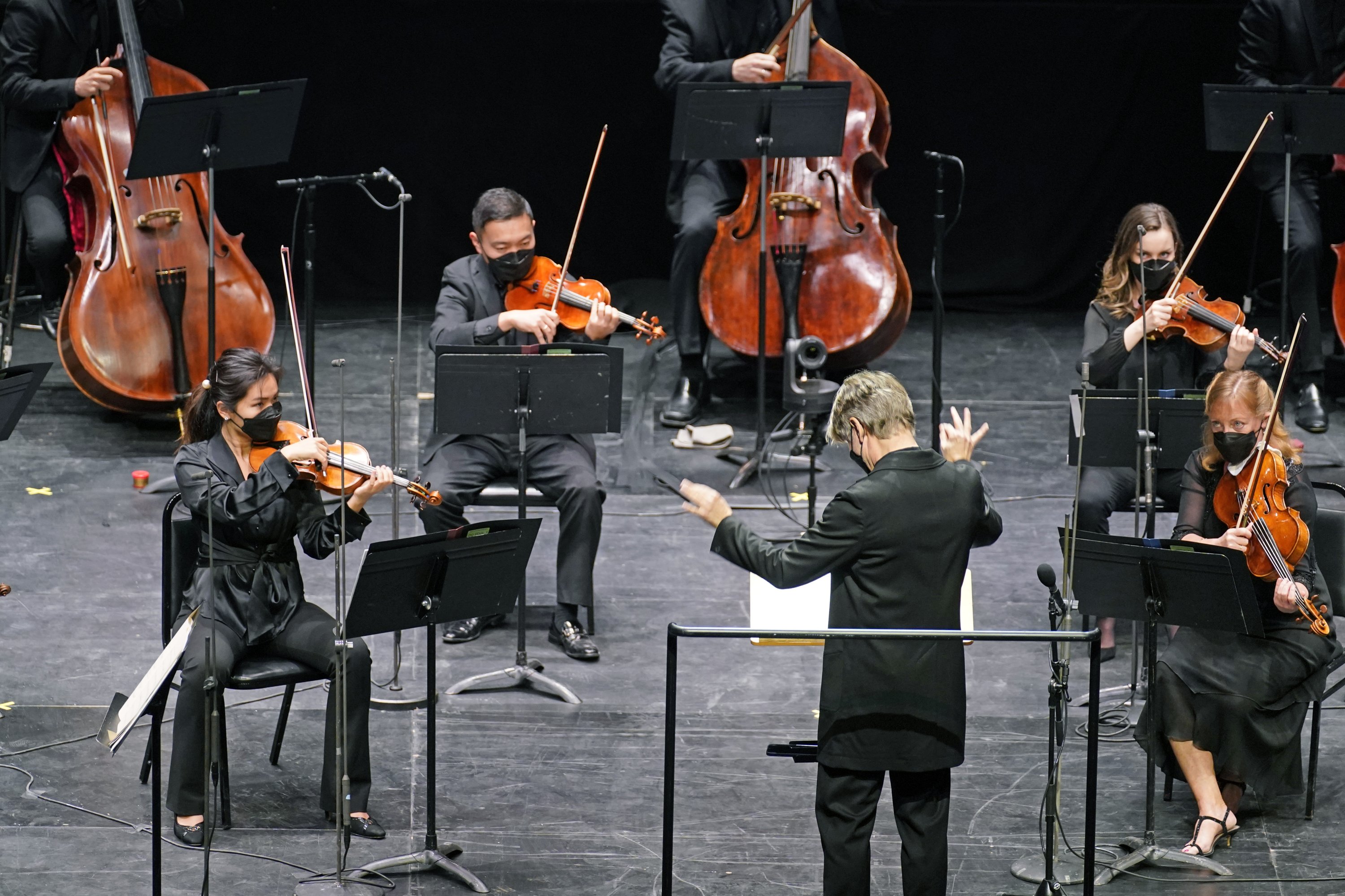 Essa-Pekka Salonen leads members of the New York Philharmonic as a guest conductor before an audience of 150 concertgoers at The Shed in Hudson Yards, New York, U.S., Wednesday, April 14, 2021. (AP Photo)