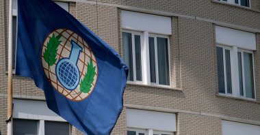 A logo of the Organisation for the Prohibition of Chemical Weapons (OPCW) is seen on a flag fluttering at the entrance of its headquarters building on June 24, 2020 in The Hague, Netherlands. (Getty Images)