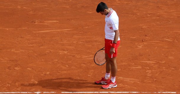 Serbia's Novak Djokovic reacts during his third-round singles match against Britain's Daniel Evans at the Monte-Carlo ATP Masters, Monaco, April 15, 2021. (AFP Photo)