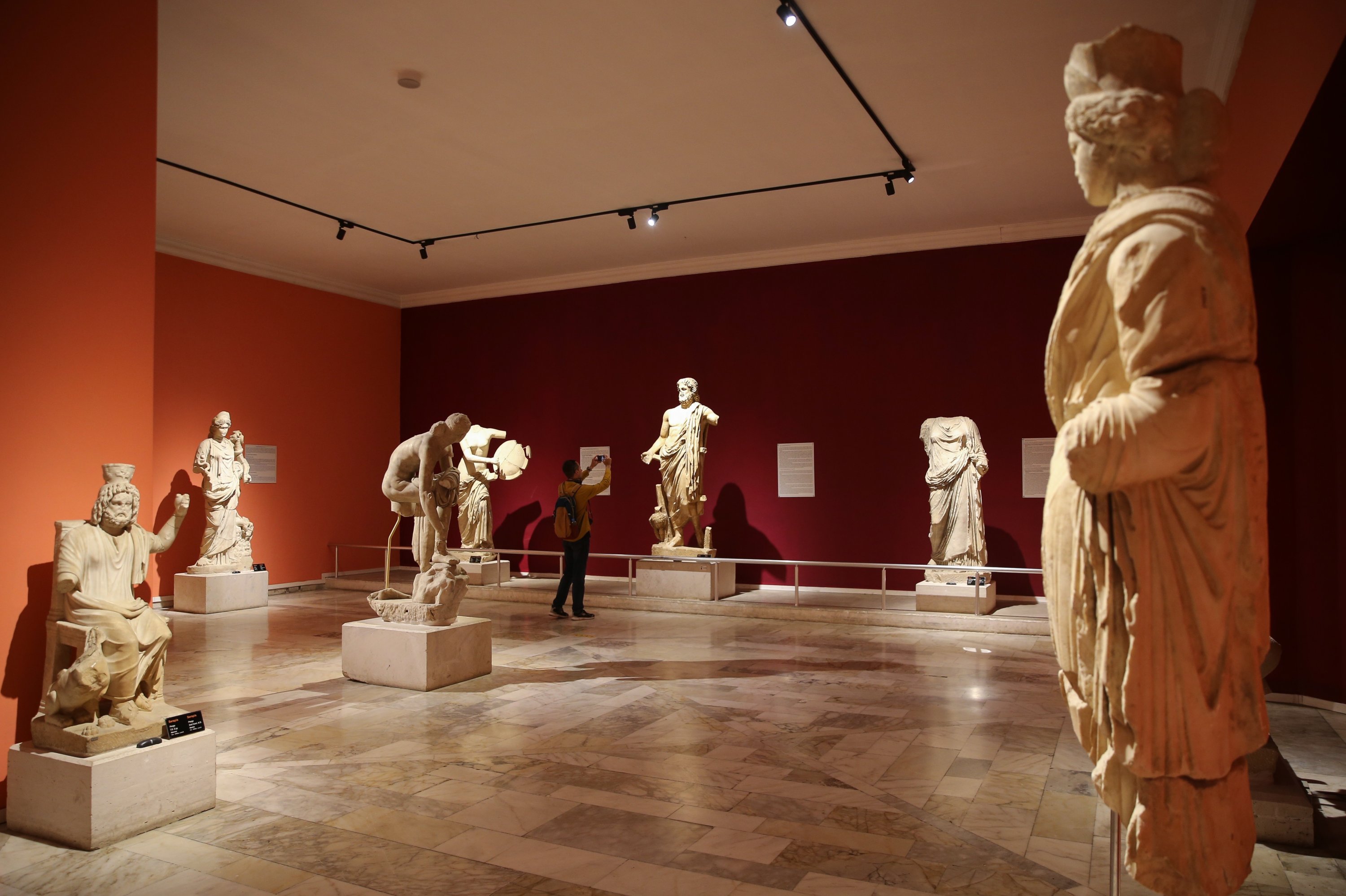 Visitors examine artifacts in the Antalya Museum, Antalya, southern Turkey, April 16, 2021. (AA Photo)