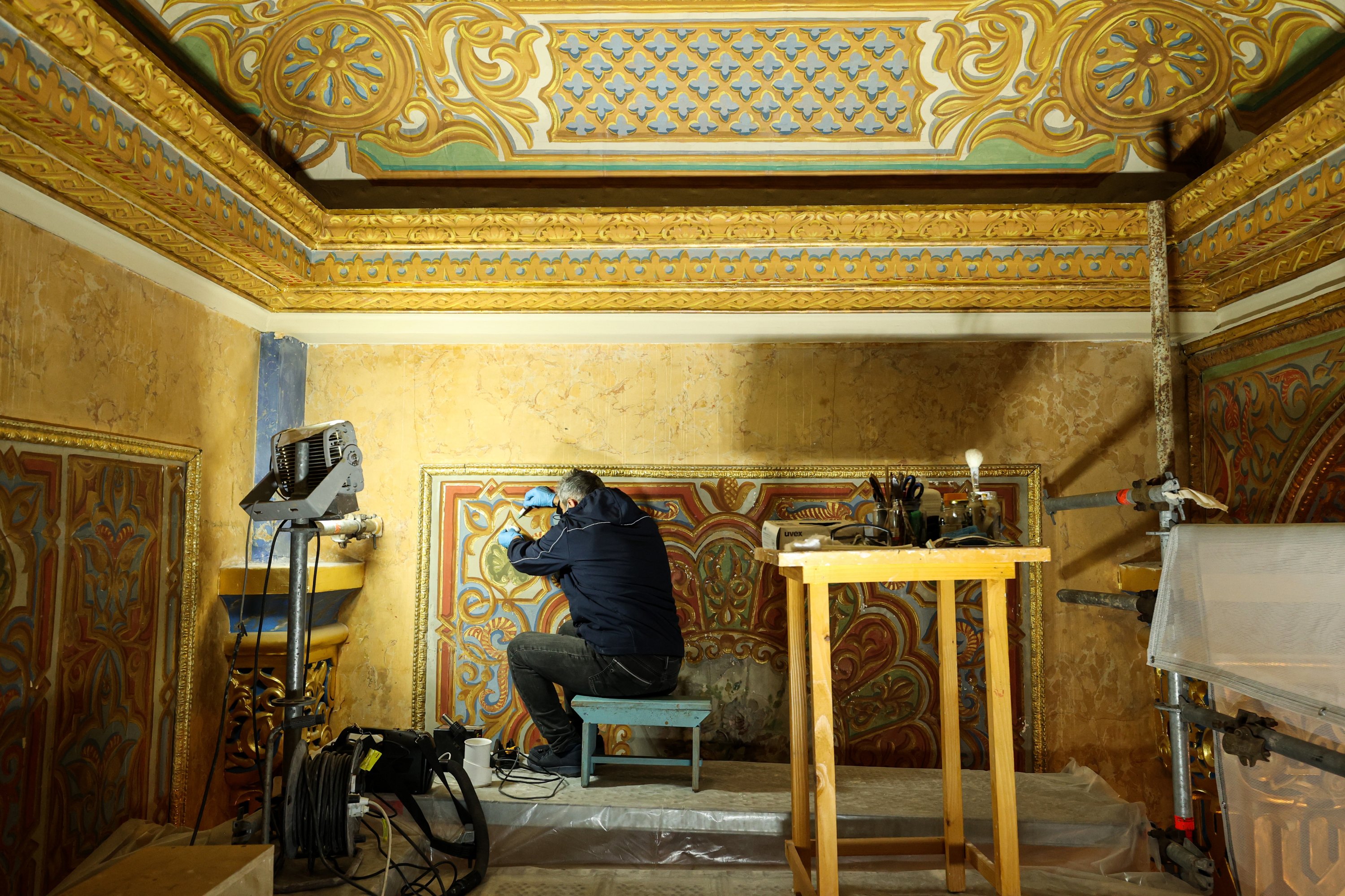 A restorer works on a wall of the Beylerbeyi Palace, Istanbul, Turkey, April 16, 2021. (AA Photo)