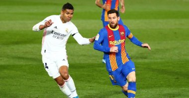 Real Madrid's Casemiro in action with Barcelona's Lionel Messi in a La Liga match Estadio Alfredo Di Stefano, Madrid, Spain, April 10, 2021. (Reuters Photo)