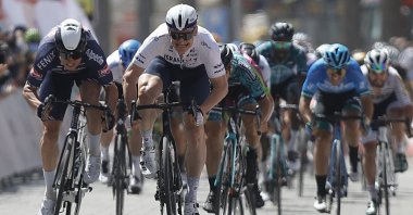 Belgium's Jasper Philipsen (L) approaches the finish line of the 129.1-kilometer (80.2-mile) sixth stage of the 56th Presidential Cycling Tour of Turkey, Marmaris, southern Turkey, April 16, 2021. (AA Photo)