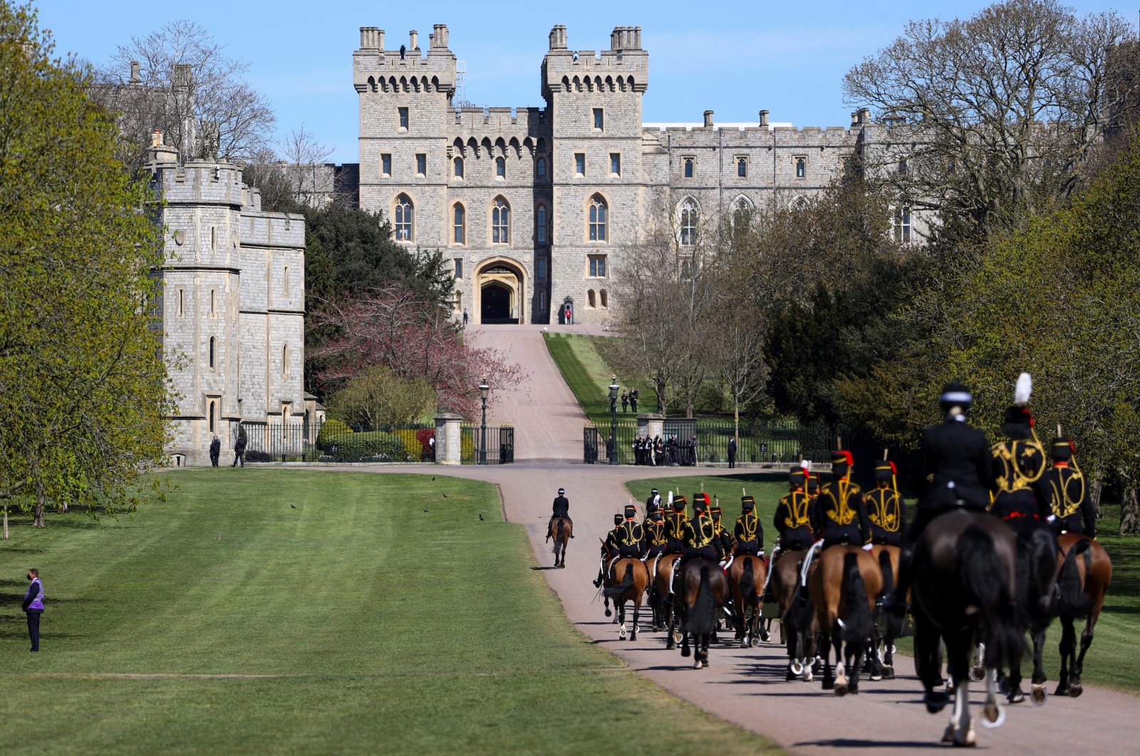 Members of the Kings Troop Royal Horse Artillery arrive at Windsor Castle on the day of the funeral of Britain's Prince Philip, husband of Queen Elizabeth II, who died at the age of 99, in Windsor, Britain, April 17, 2021. (Reuters Photo)