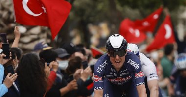 Belgium's Jasper Philipsen approaches the finish line of the 180-kilometer (111.8-mile) seventh stage between Marmaris and Turgutreis on the 56th Presidential Cycling Tour of Turkey, Turgutreis, southern Turkey, April 16, 2021. (AA Photo)