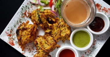 Garam garam pakora (mixed vegetable fritters) photographed at Bombay Street Food in Washington, DC, Dec. 13, 2018. (Getty Images).