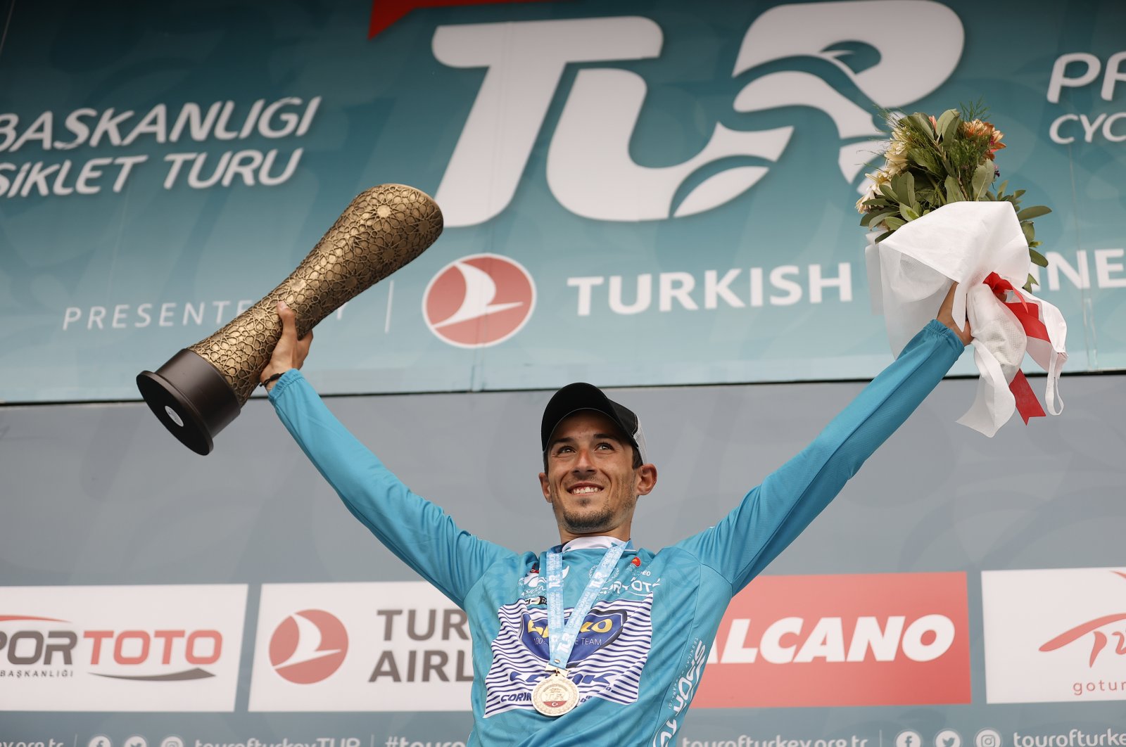 Delko's Spanish cyclist Jose Manuel Diaz Gallego celebrates winning the 56th Presidential Cycling Tour of Turkey, Kuşadası, western Turkey, April 18, 2021.