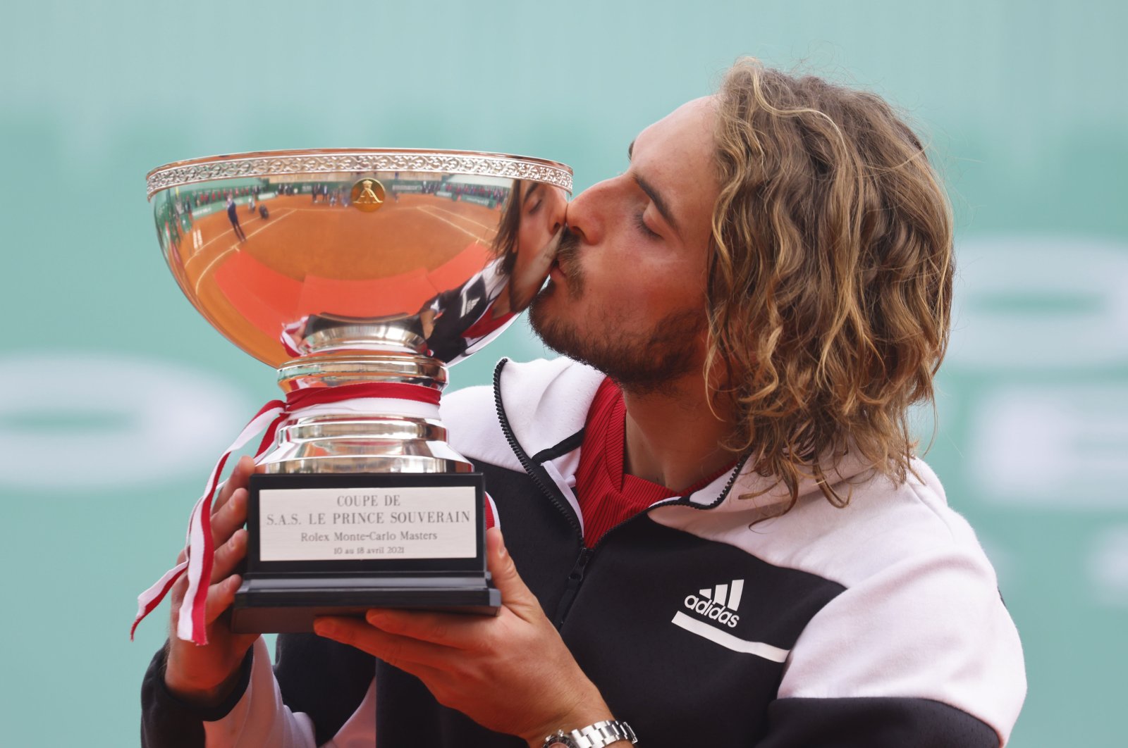 Greece's Stefanos Tsitsipas celebrates with the Monte Carlo Masters trophy after winning the final against Russia's Andrey Rublev, Roquebrune-Cap-Martin, France, April 18, 2021.