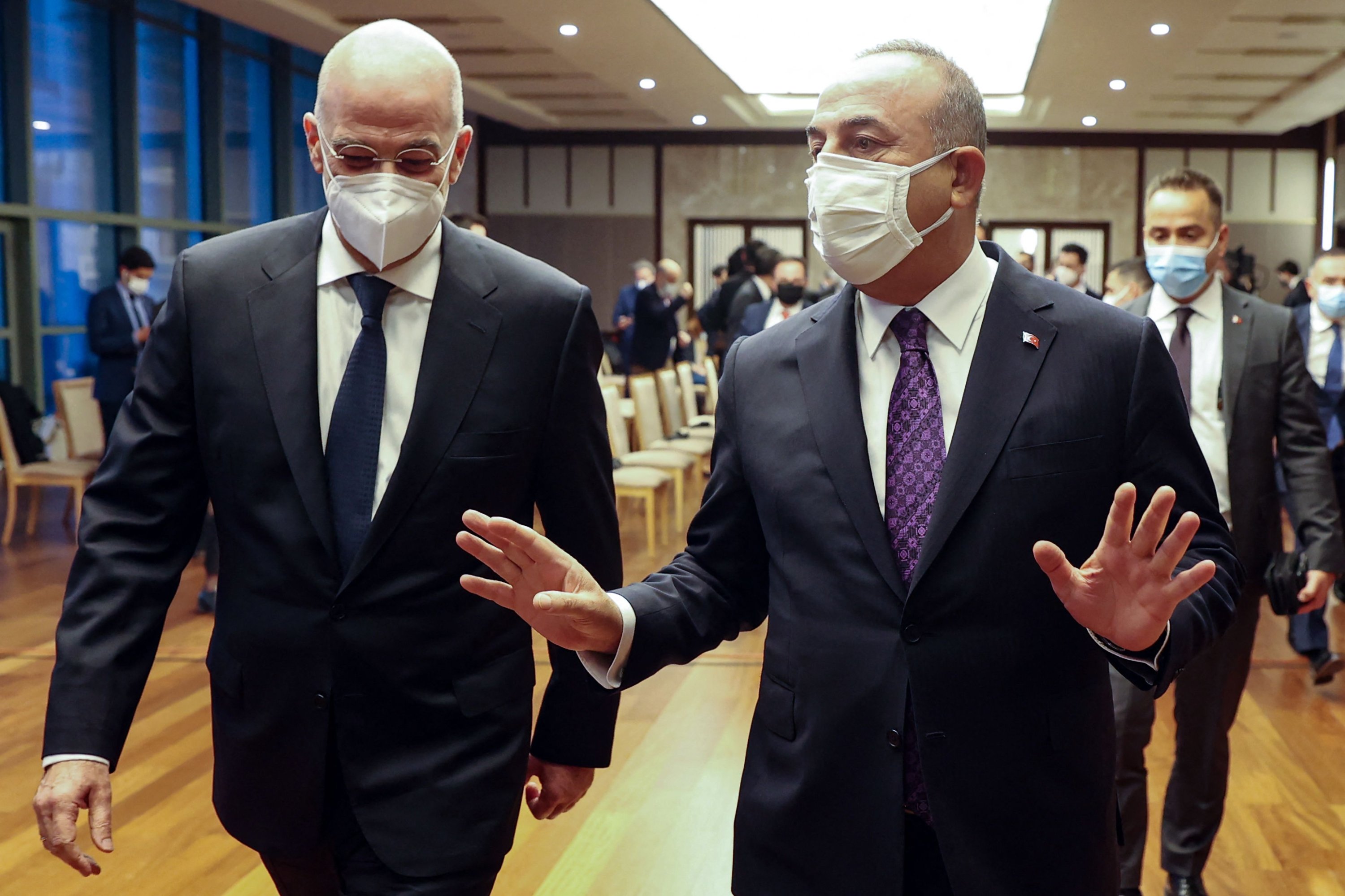 Greece's Foreign Minister Nikos Dendias (L) and Foreign Minister Mevlüt Çavuşoğlu arrive to hold joint press conference following their meeting in Ankara, Turkey, April 15, 2021. (AFP Photo)