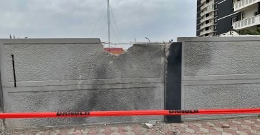 A wall damaged by rocket attacks in a residential complex in Irbil, Iraq, Tuesday, Feb. 16, 2021. (AP File Photo)