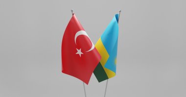 The flags of Turkey and Rwanda are pictured here together. (Shutterstock)