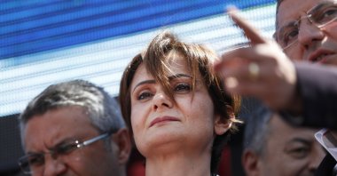 Canan Kaftancıoğlu, Turkey's opposition Republican People's Party (CHP) Istanbul provincial chairperson is surrounded by supporters outside a court in Istanbul, Turkey, July 18, 2019. (AP File Photo)