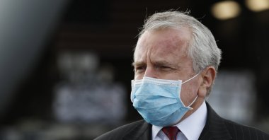 U.S. ambassador to Russia John Sullivan wearing a protective face mask stands next to a U.S. Air Force C-17 Globemaster transport plane at Vnukovo International Airport amid the outbreak of the COVID-19 pandemic, Moscow, Russia, May 21, 2020. (EPA Photo)