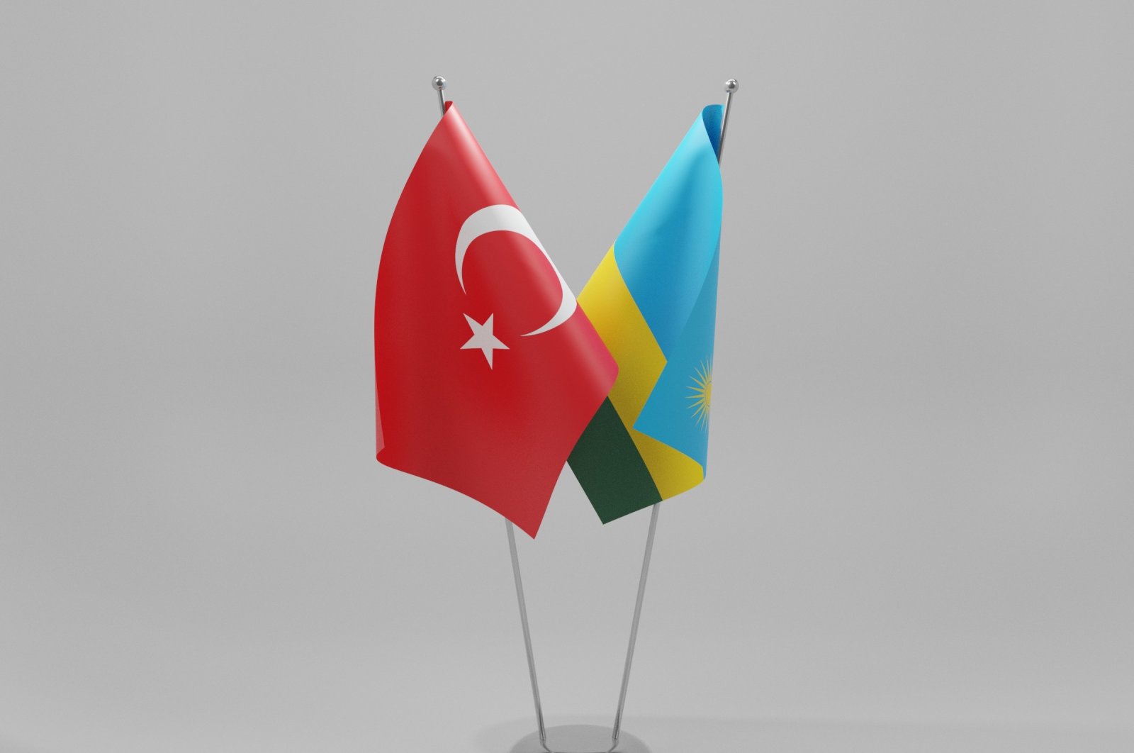 The flags of Turkey and Rwanda are pictured here together. (Shutterstock)