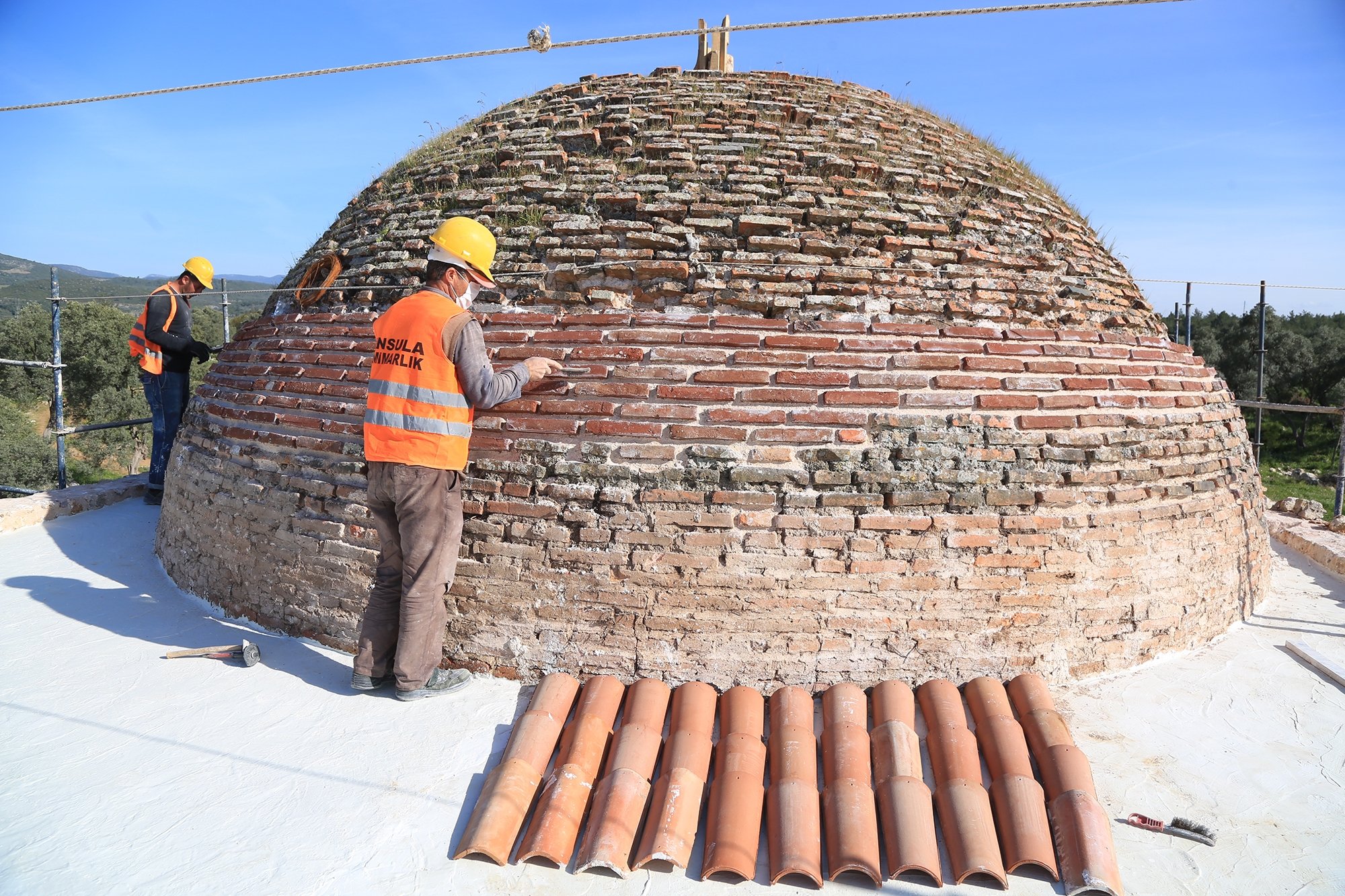 Restorers work on the dome of the Yelli mosque in the ancient city of Beçin, Muğla, southwestern Turkey, April 20, 2021. (AA Photo) 