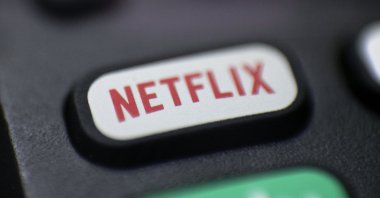 A Netflix logo is seen on a remote control in Portland, Oregon, Aug. 13, 2020. (AP Photo)
