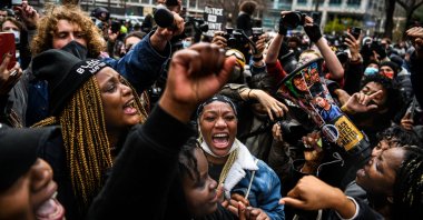 People celebrate as the verdict is announced in the trial of former police officer Derek Chauvin outside the Hennepin County Government Center in Minneapolis, Minnesota, U.S., April 20, 2021. (AFP Photo)
