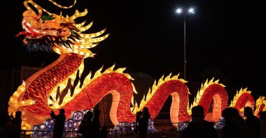 Residents visiting a dragon lantern during a festival show in Wuhan, Hubei province, China, Feb. 26, 2021. (Photo by Getty Images)