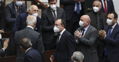 Turkey's newly appointed Trade Minister Mehmet Muş (C) arrives for the ruling Justice and Development Party (AK Party)'s parliamentary group meeting in the capital Ankara, Turkey, April 21, 2021. (AA Photo)