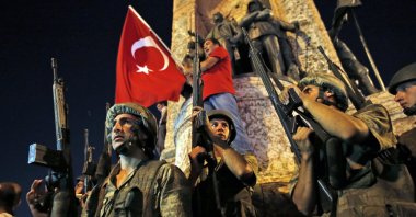 Turkish soldiers secure the area as supporters of Turkey's President Recep Tayyip Erdogan protest in Istanbul's Taksim square, July 16, 2016. (AP)