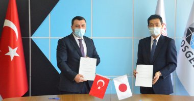 Small and Medium Industry Development Organization (KOSGEB) head Hasan Basri Kurt (L) and Japan International Cooperation Agency (JICA) Turkey head Nobuhiro Ikuro during a signing ceremony, Istanbul, Turkey, April, 21, 2021. (IHA Photo)