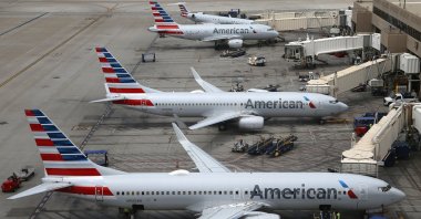 American Airlines planes are parked on the tarmac at Phoenix Sky Harbor International Airport, Phoenix, U.S., July 17, 2019. (AP Photo)